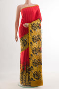 Red Mysore Crepe Saree with Printed design on the body and Printed Border.  displayed on a mannequin