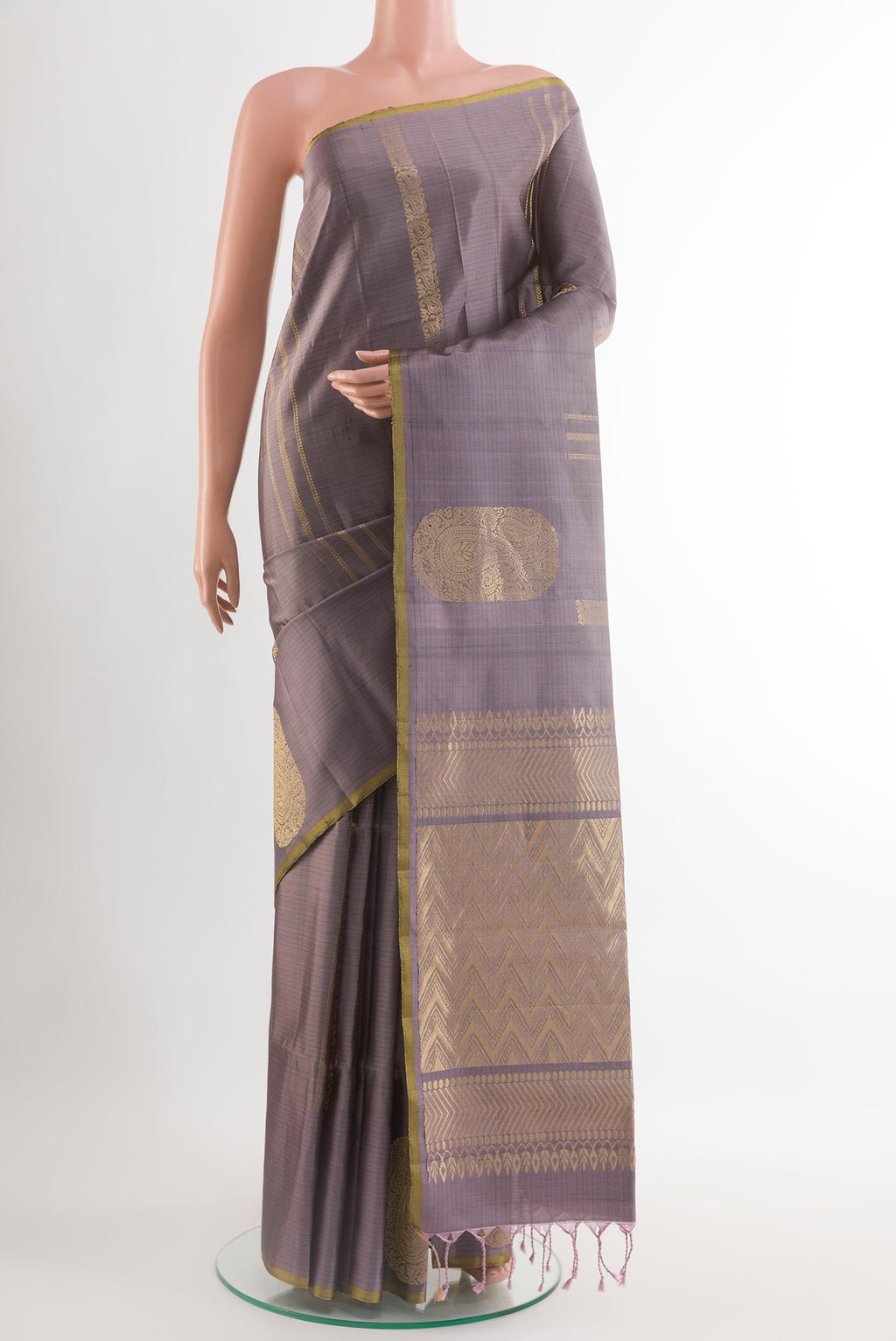Lilac Soft Silk Saree with Stripes on the body and Zari Border.  displayed on a mannequin