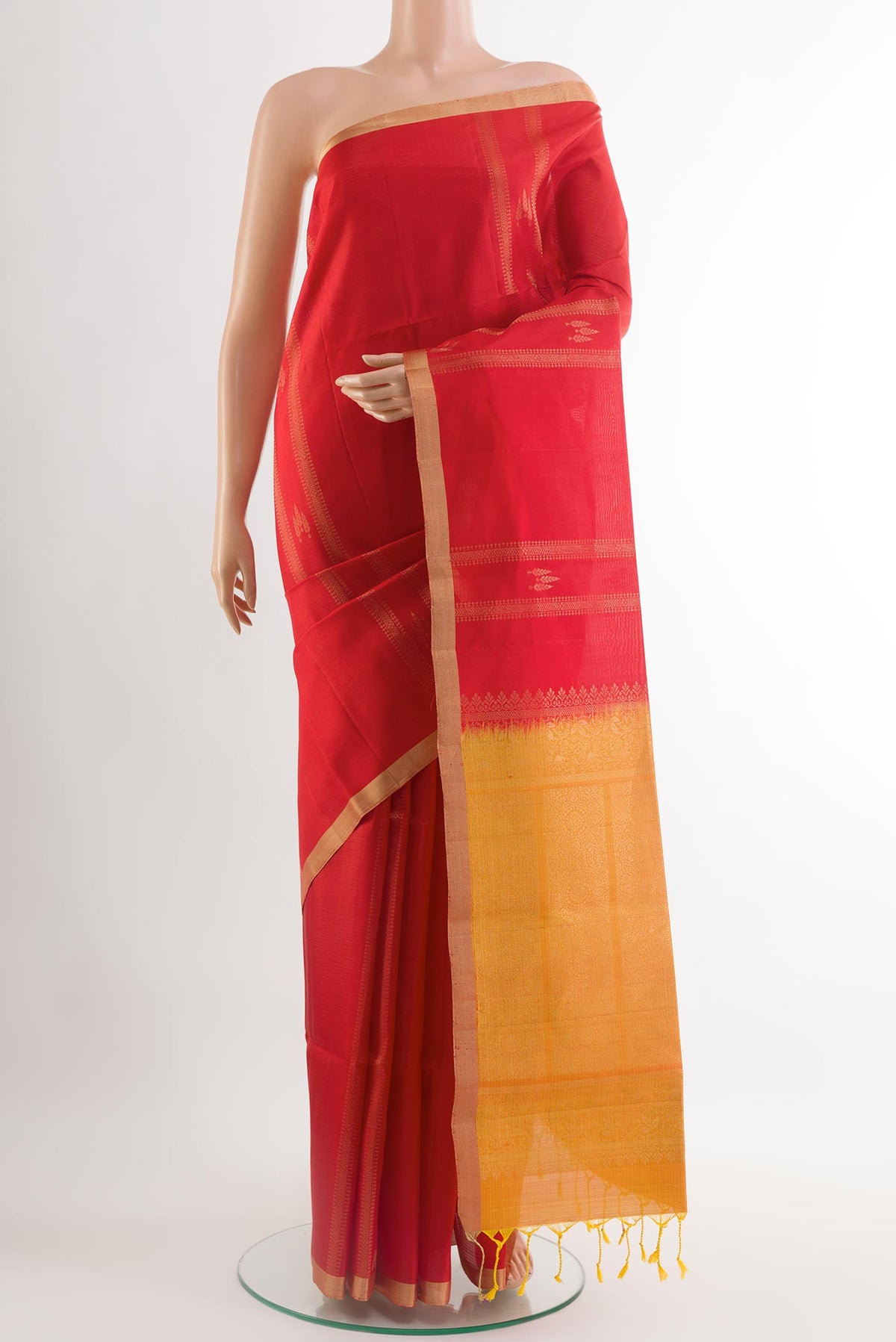 Red Soft Silk Saree with Stripes on the body and Zari Border.  displayed on a mannequin