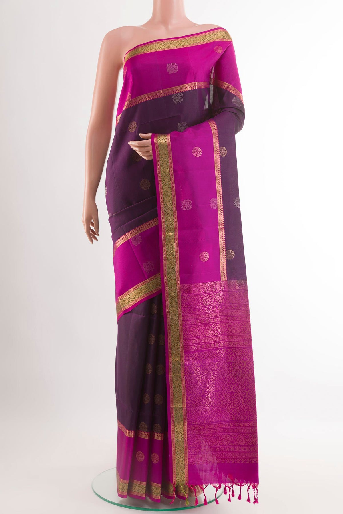 Purple Soft Silk Saree with Zari Butta on the body and Zari Border.  displayed on a mannequin