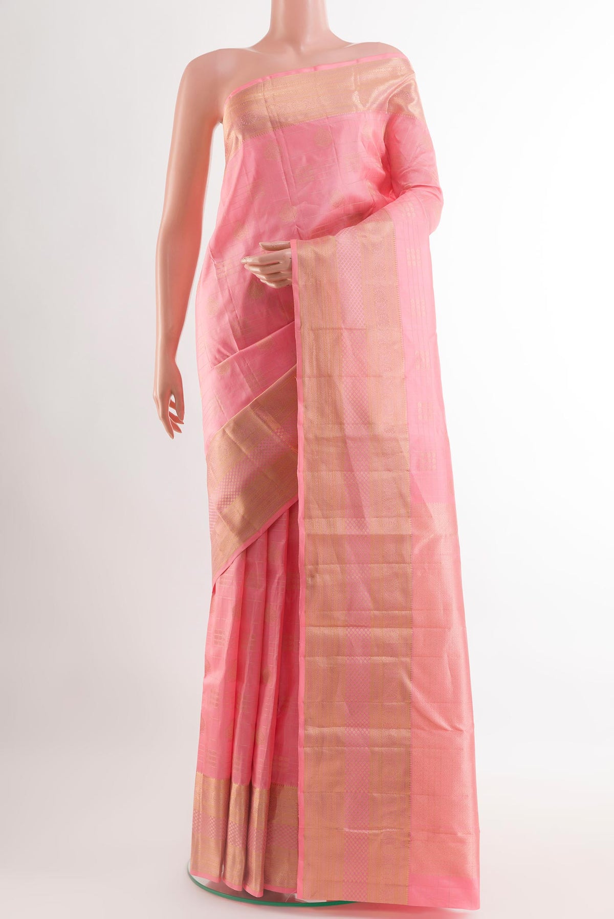 Pink Kanjivaram Silk Saree with Zari Butta on the body and Zari Border.  displayed on a mannequin
