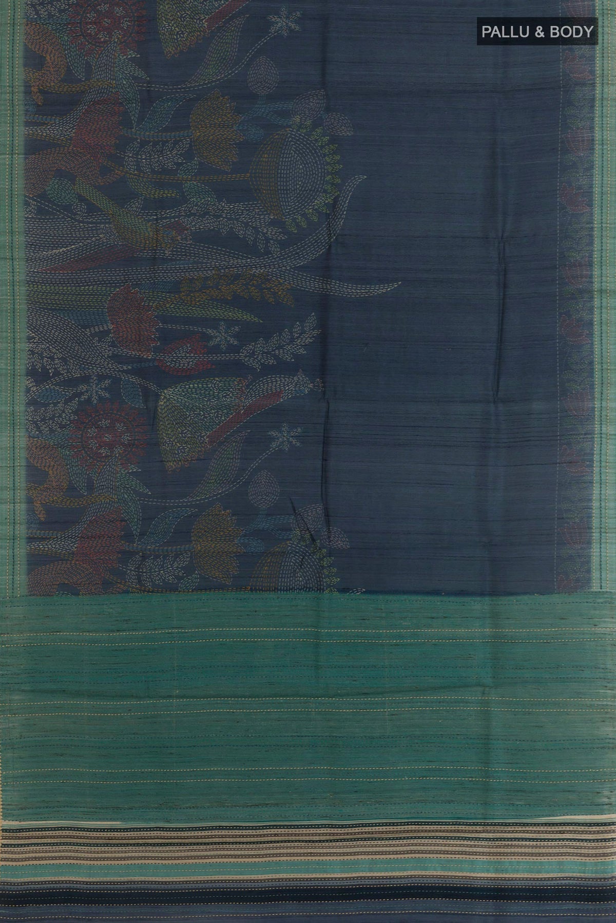 Flat view of Blue Tussar Saree with Printed design on the body and Embroidery Border. 