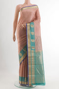 Beige Kanjivaram Silk Saree with Jacquard With Zari Butta on the body and Zari Border.  displayed on a mannequin