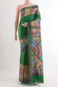 Green Tussar Saree with Plain Body and Embroidery Border.  displayed on a mannequin