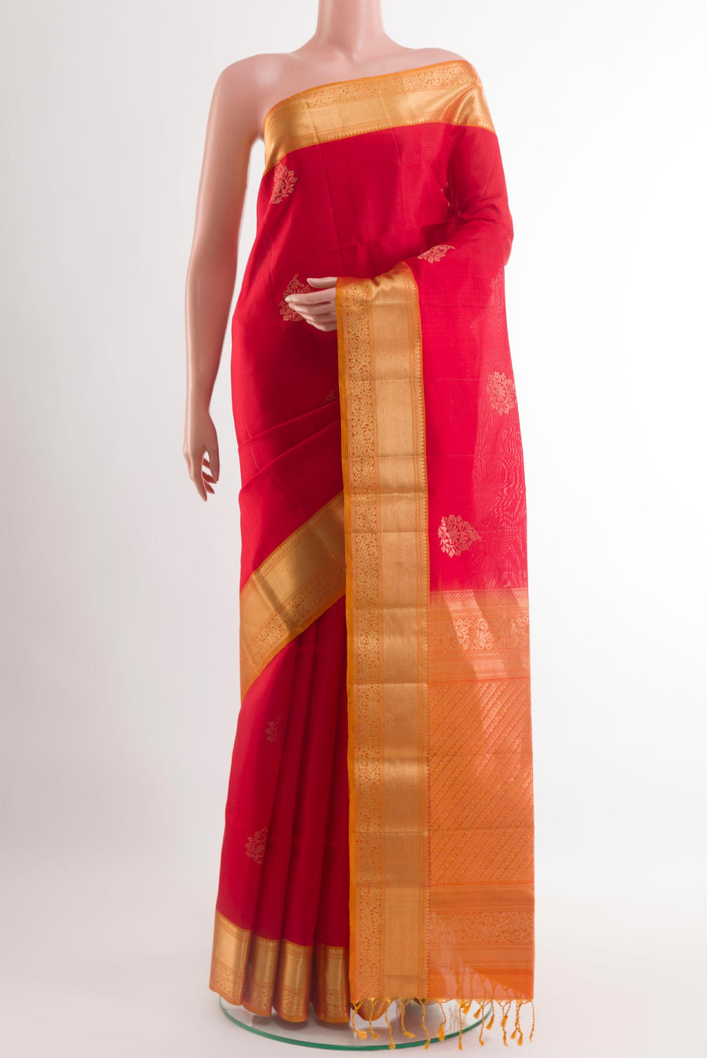 Red Soft Silk Saree with Zari Butta on the body and Zari Border.  displayed on a mannequin