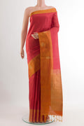 Red Soft Silk Saree with Checked design on the body and Zari Border.  displayed on a mannequin