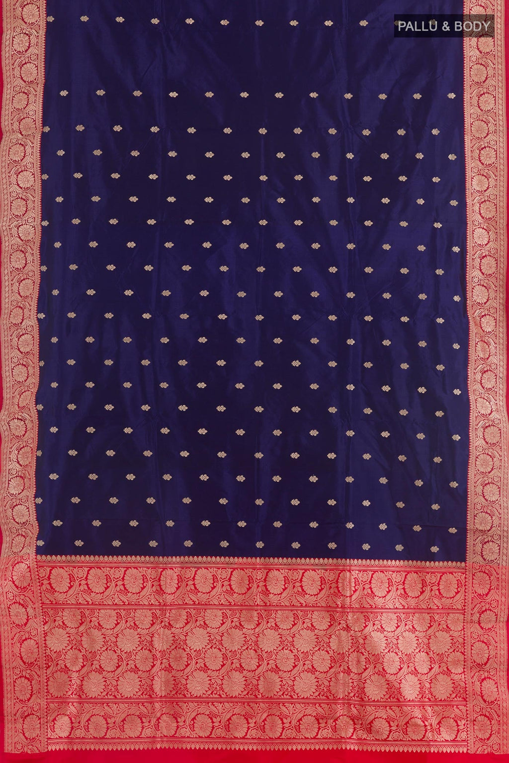 Flat view of Blue Banarasi Katan Silk Saree with Zari Butta on the body and Zari Border. 