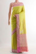 Lemon Yellow Banarasi Silk Saree with Zari Butta on the body and Zari Border.  displayed on a mannequin
