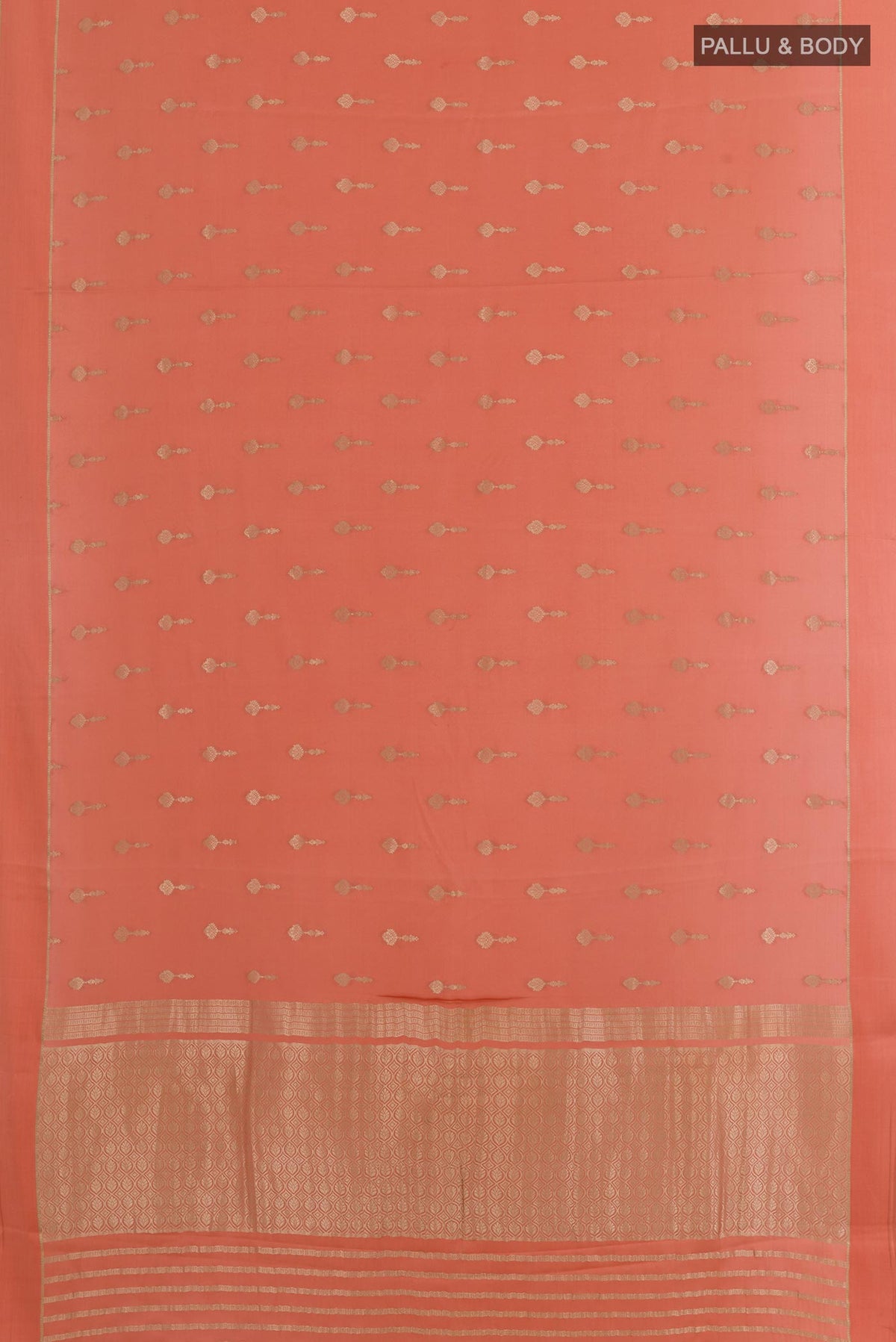 Flat view of Peach Mysore Crepe Saree with Zari Butta on the body and Zari Border. 