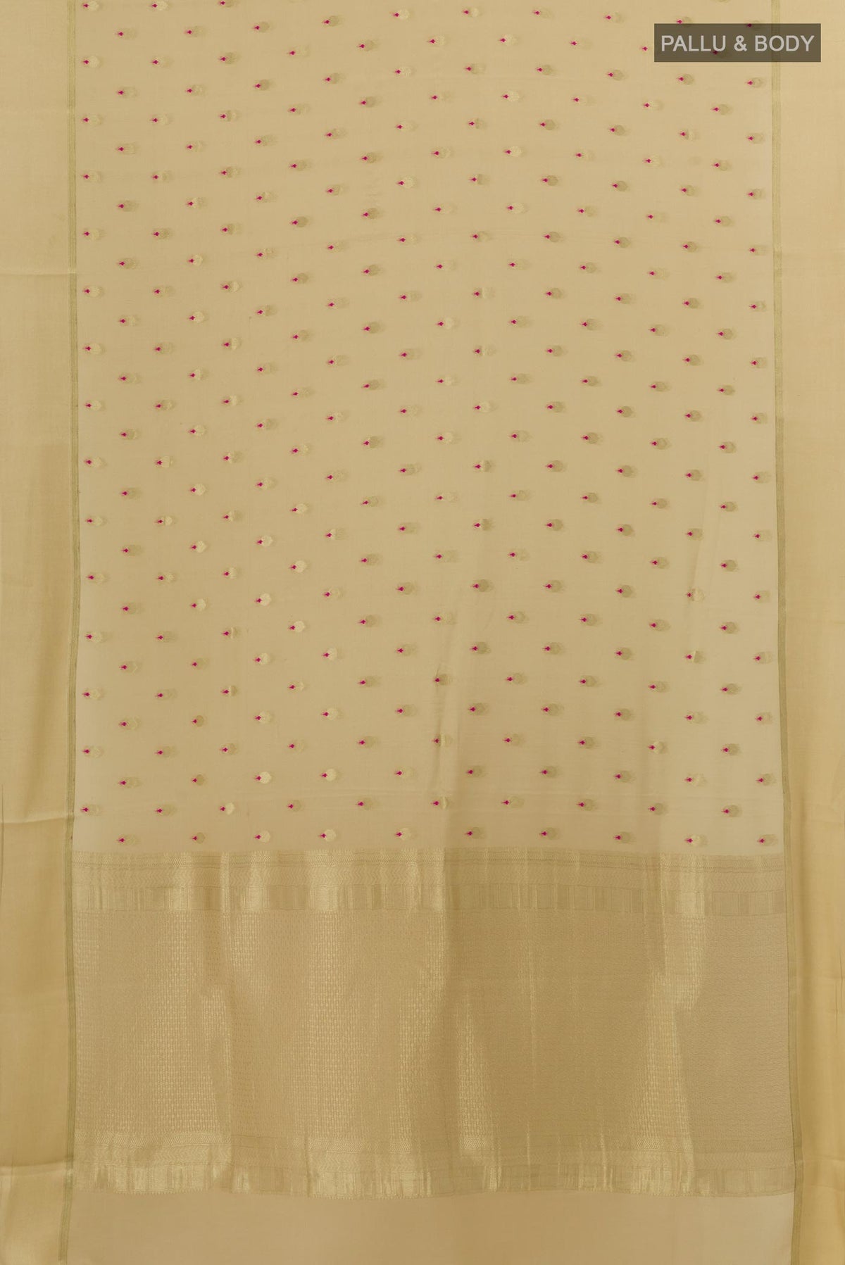 Flat view of Beige Mysore Crepe Saree with Zari Butta on the body and Zari Border. 