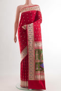 Red Banarasi Silk Saree with Zari Butta on the body and Paithani Border.  displayed on a mannequin