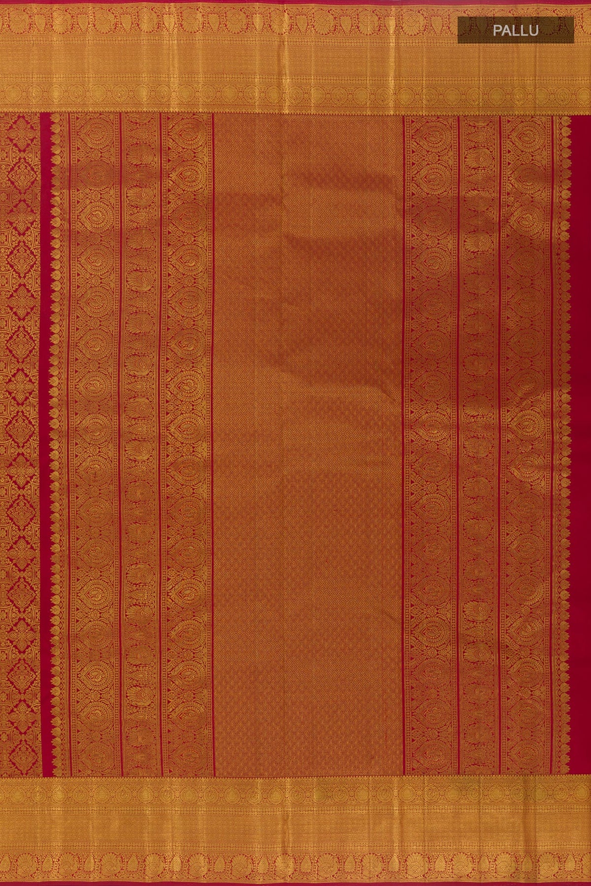 Close up image of the pallu of Maroon Kanchipuram Silk Saree with Zari Brocade on the body and Zari Border. 