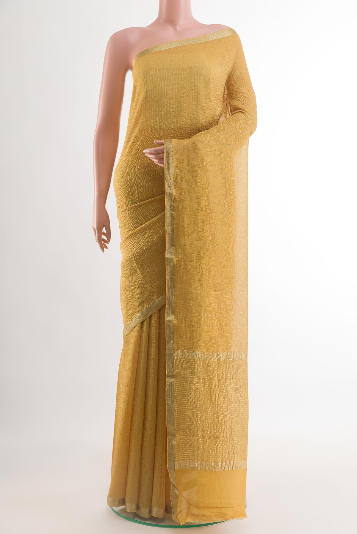 Yellow Mysore Crepe Saree with Stripes on the body and Zari Border.  displayed on a mannequin
