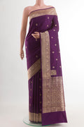 Purple Banarasi Silk Saree with Zari Butta on the body and Zari Border.  displayed on a mannequin