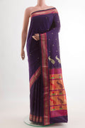 Purple Paithani Silk Saree with Zari Butta on the body and Zari Border.  displayed on a mannequin