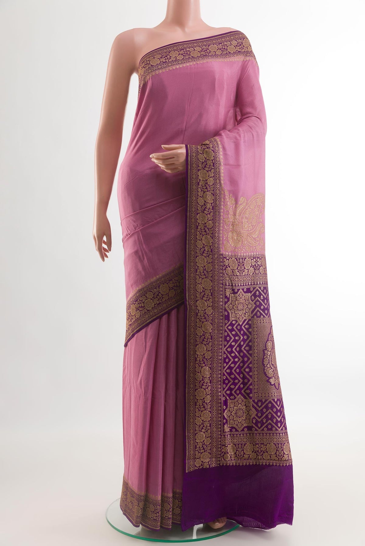 Pink Banarasi Georgette Saree with Plain Body and Zari Border.  displayed on a mannequin
