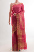 Pink Tussar Silk Saree with Embroidery on the body and Embroidery Border.  displayed on a mannequin