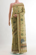 Green Tussar Silk Saree with Printed design on the body and Zari Border.  displayed on a mannequin