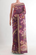 Purple Tussar Silk Saree with Floral Print on the body and Zari Border.  displayed on a mannequin
