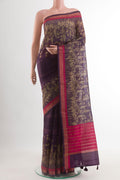 Purple Tussar Saree with Printed design on the body and Zari Border.  displayed on a mannequin