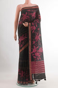 Black Tussar Saree with Stripes on the body and Zari Border.  displayed on a mannequin