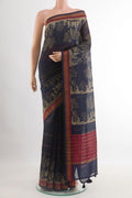 Blue Tussar Saree with Stripes on the body and Zari Border.  displayed on a mannequin
