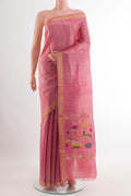 Pink Tussar Saree with Zari Butta on the body and Zari Border.  displayed on a mannequin