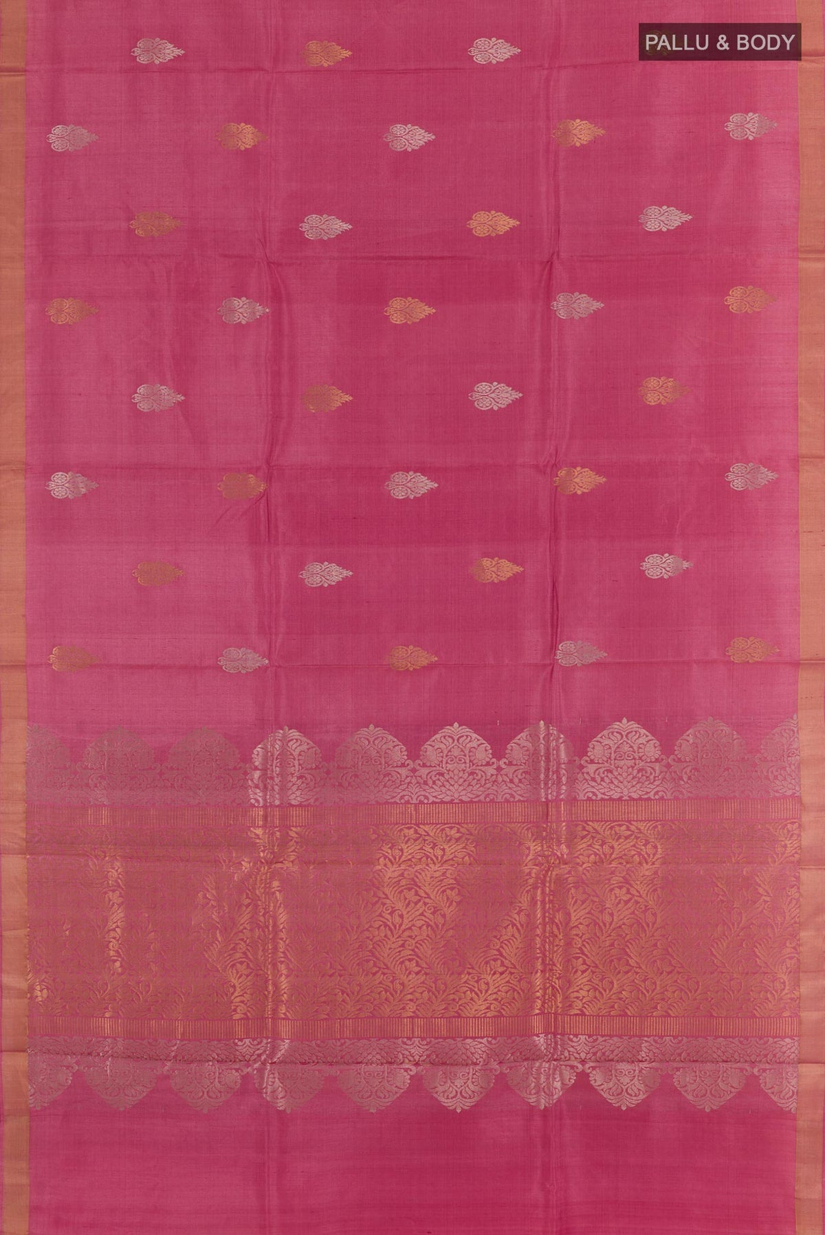 Flat view of Pink Tussar Silk Saree with Zari Butta on the body and Zari Border. 