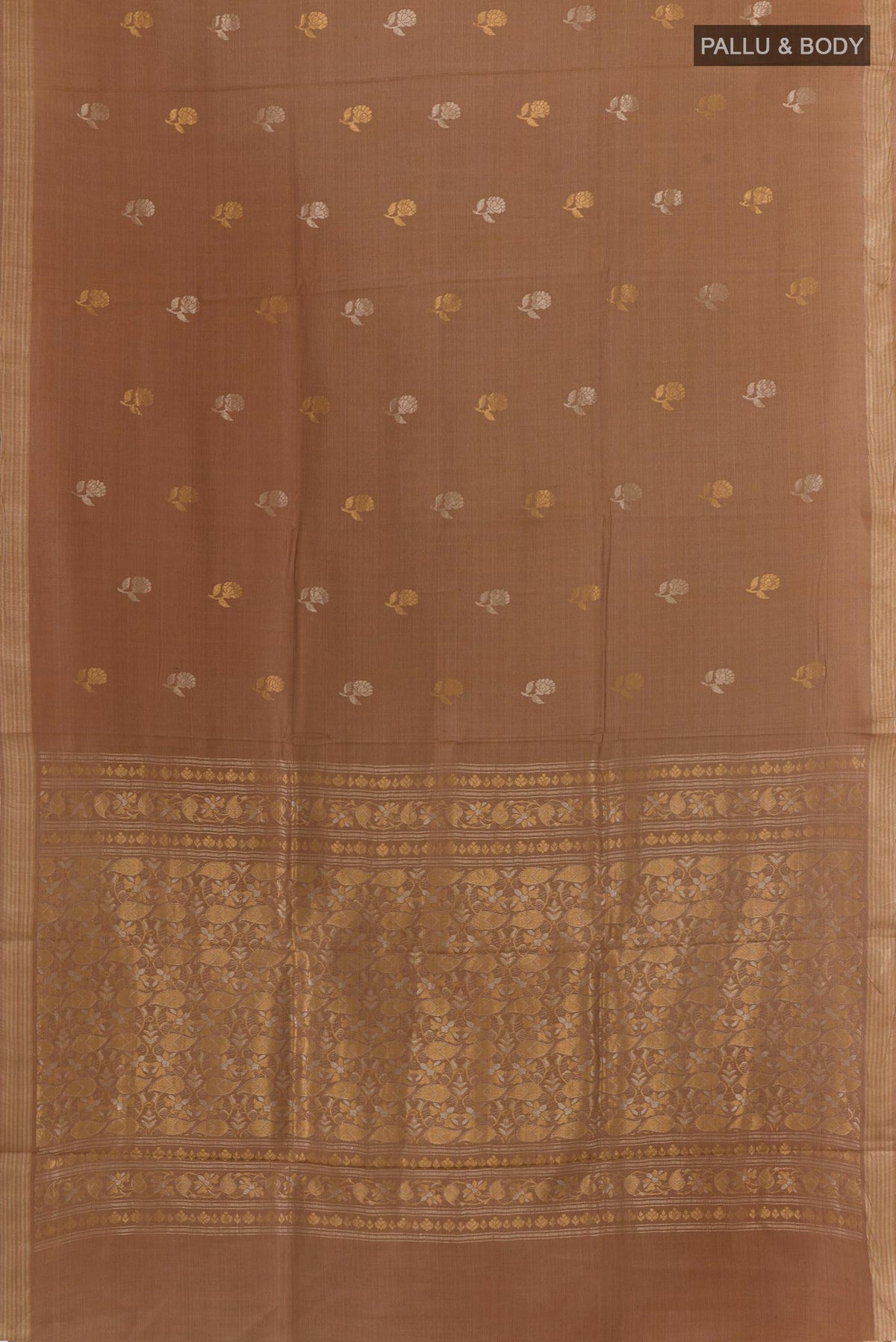 Flat view of Brown Tussar Saree with Zari Butta on the body and Zari Border. 