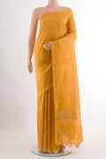 Yellow Tussar Saree with Printed design on the body and Zari Border.  displayed on a mannequin