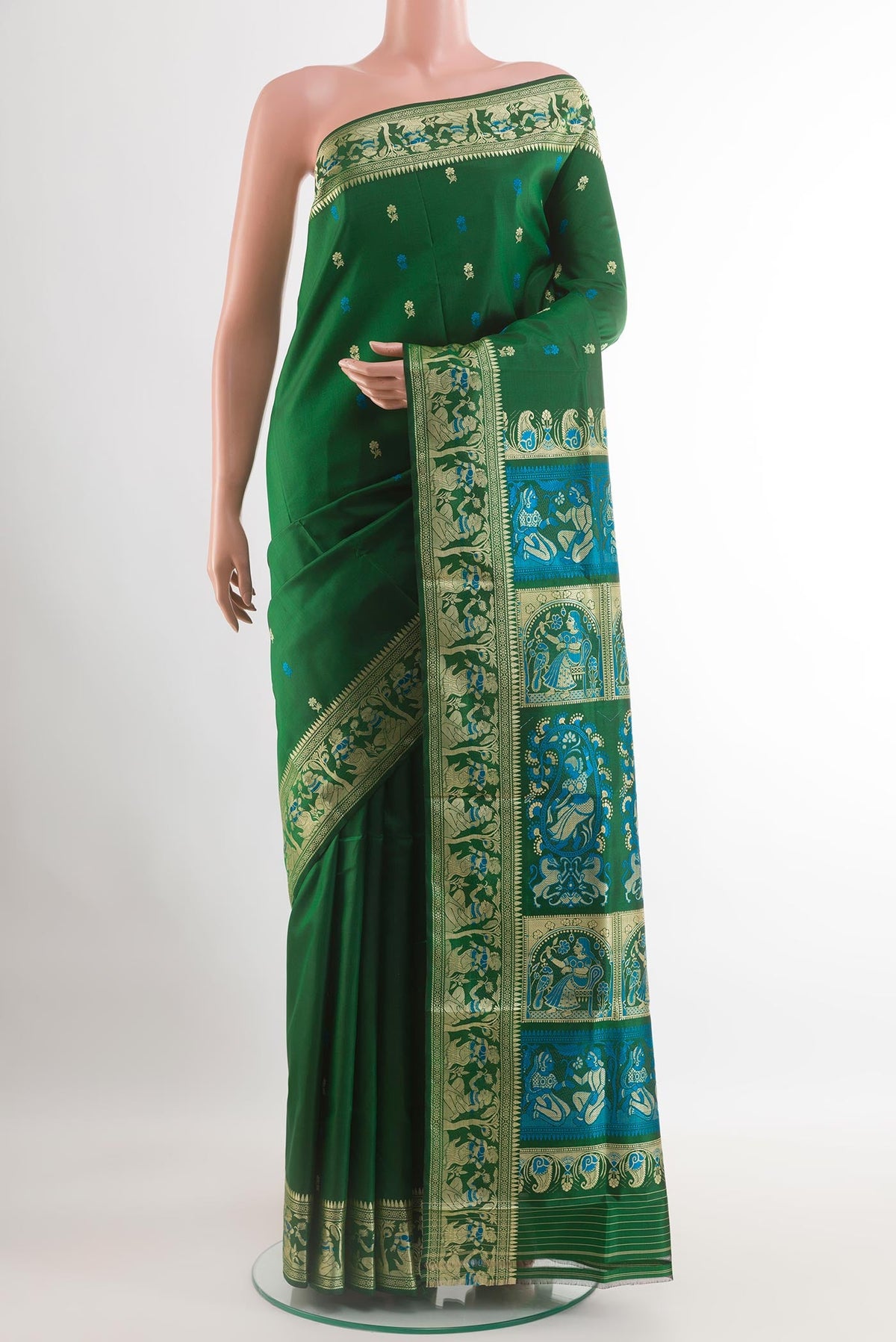 Green Baluchari Silk Saree with Zari Butta on the body and Zari Border.  displayed on a mannequin