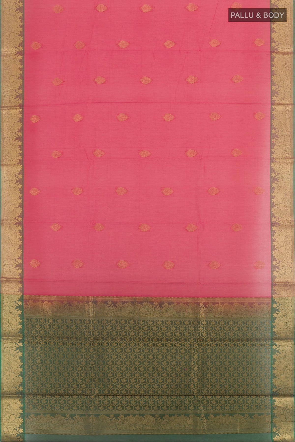 Flat view of Pink Silk Cotton Saree with Zari Butta on the body and Zari Border. 
