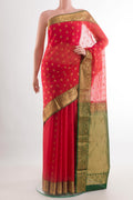 Pink Blended Kora Cotton Saree with Zari Butta on the body and Zari Border.  displayed on a mannequin