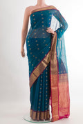 Blue Silk Cotton Saree with Zari Butta on the body and Zari Border.  displayed on a mannequin