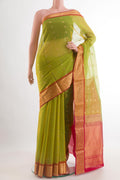 Light Green Blended Kora Cotton Saree with Zari Butta on the body and Zari Border.  displayed on a mannequin