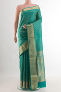 Sea Green Soft Silk Saree with Zari Brocade on the body and Zari Border.  displayed on a mannequin