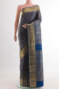 Pure Silk Pure Zari Blue Kanjivaram Saree with Zari Brocade on the body and Zari Border.  displayed on a mannequin