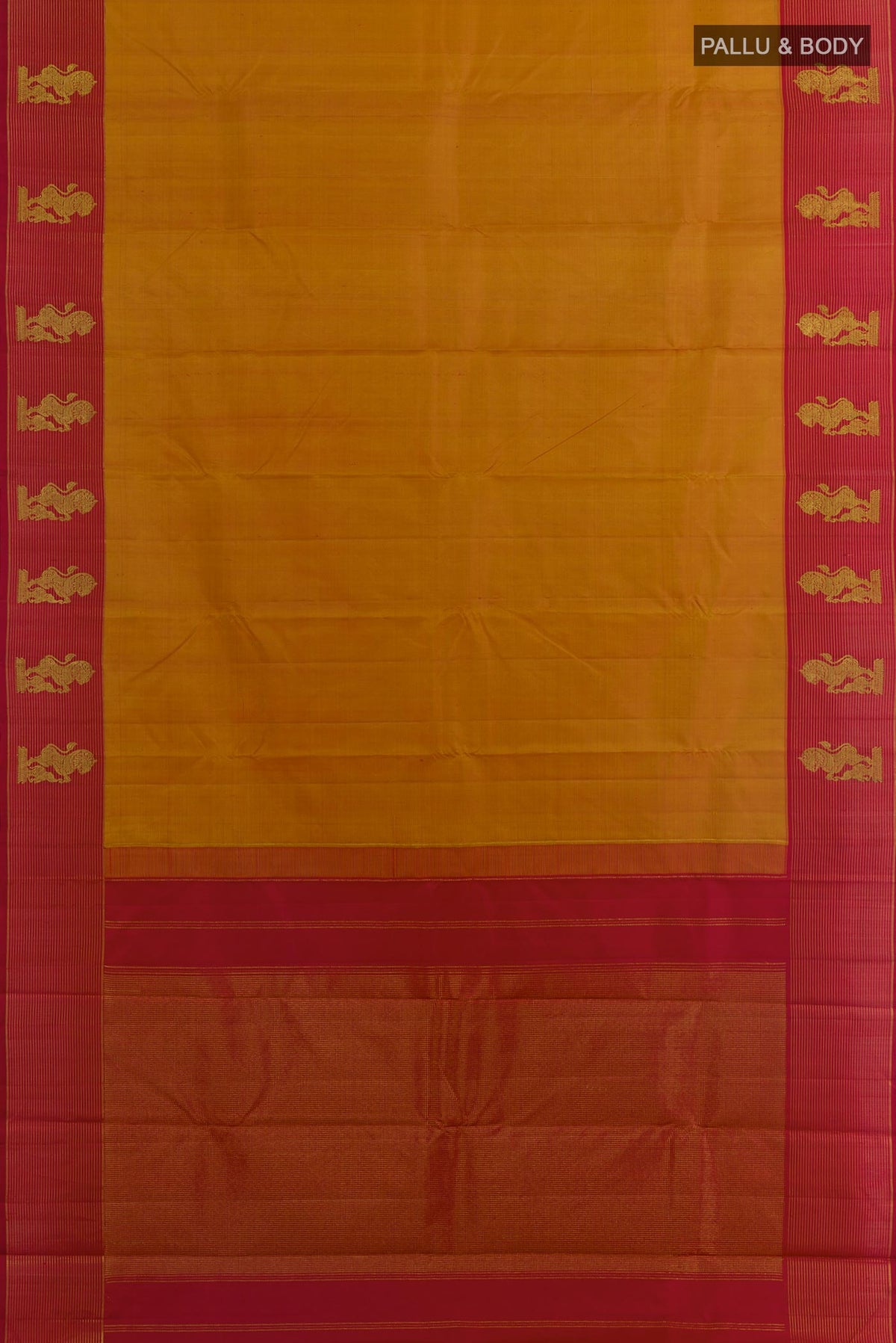 Flat view of Mustard Kanchipuram Silk Saree with Zari Butta on the body and Zari Border. 