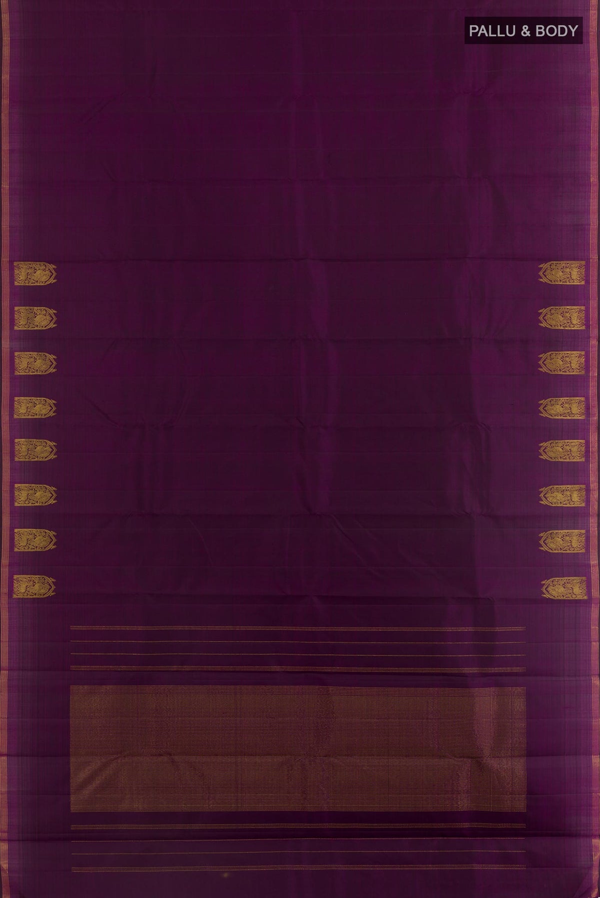 Flat view of Violet Kanchipuram Silk Saree with Plain Body and Zari Border. 