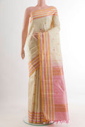 Off White Kanjivaram Silk Saree with Thread Butta on the body and Thread Border.  displayed on a mannequin