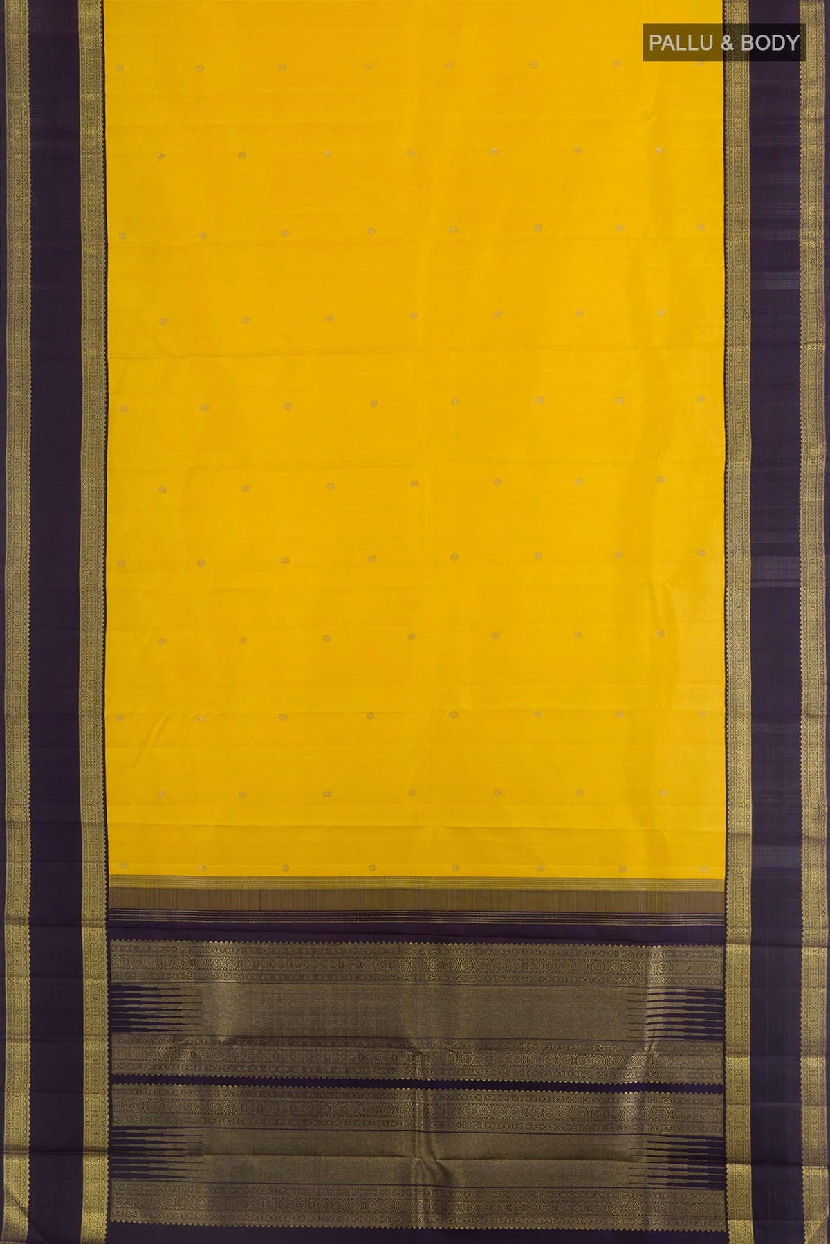 Flat view of Yellow Kanchipuram Silk Saree with Zari Butta on the body and Zari Border. 