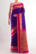 Blue Kanchipuram Silk Saree with Zari Butta on the body and Zari Border.  displayed on a mannequin