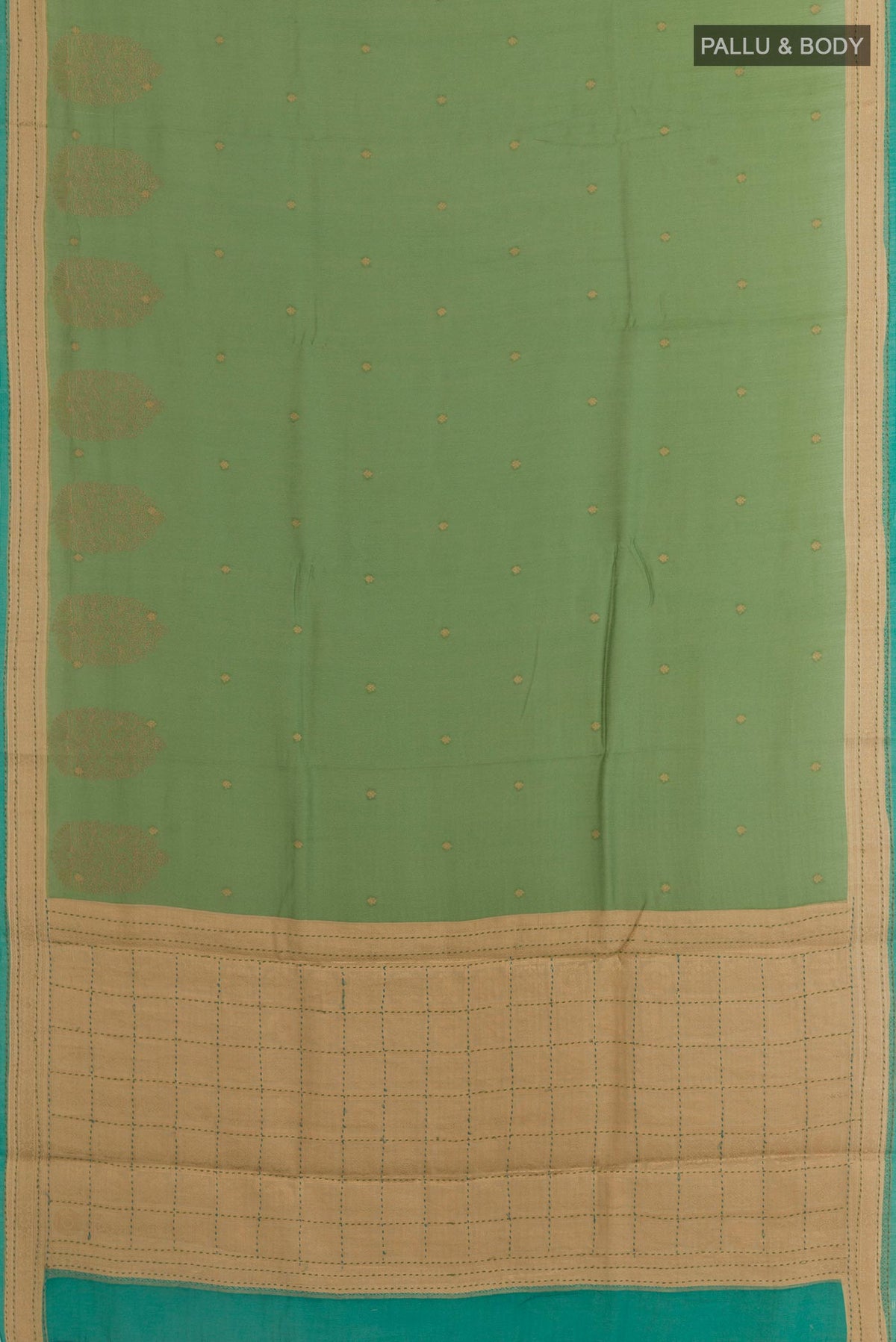 Flat view of Green Tussar Silk Saree with Zari Butta on the body and Zari Border. 