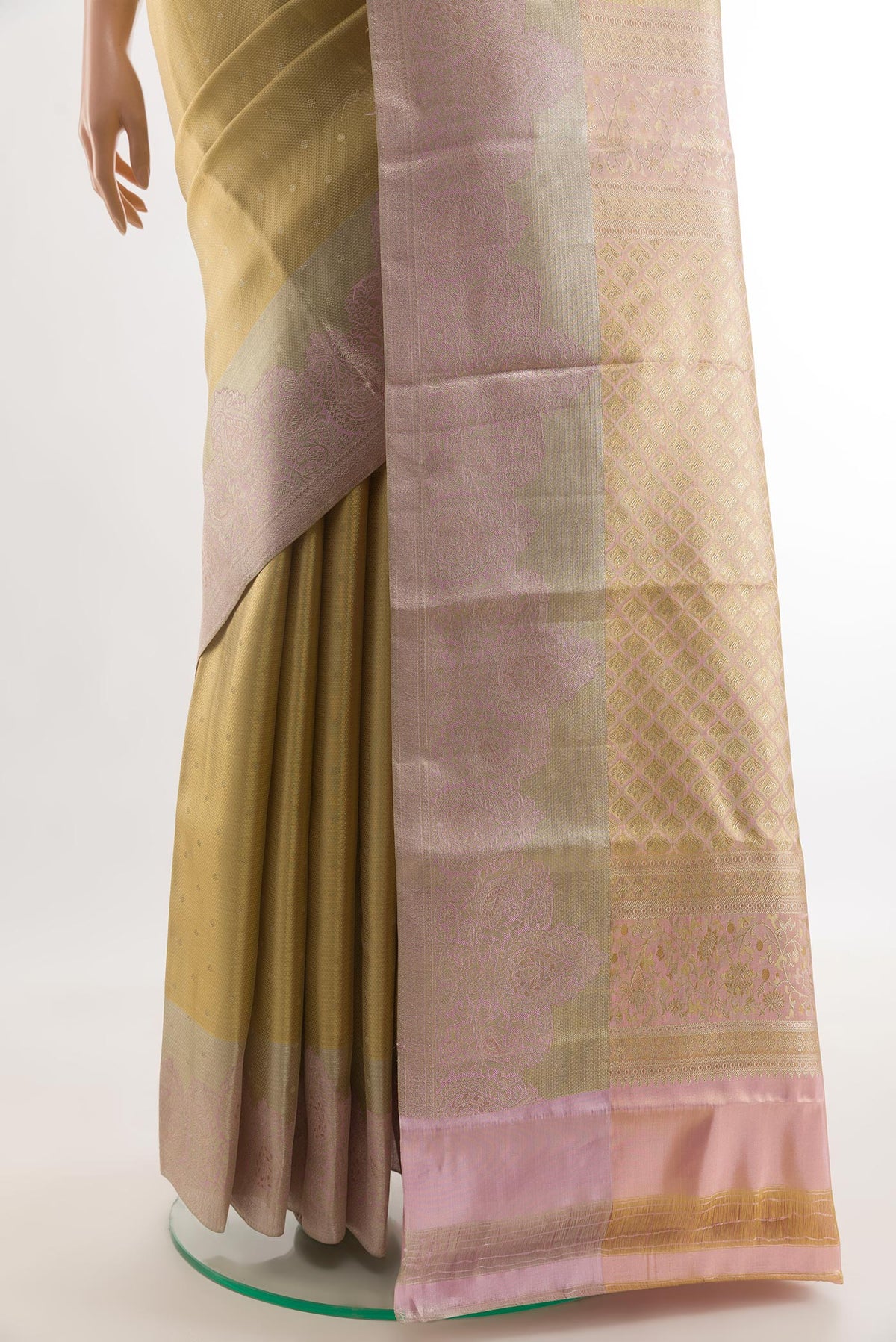 Pleats and pallu of Golden Kanjivaram Tissue Silk Saree with Zari Brocade on the body and Zari Border. 