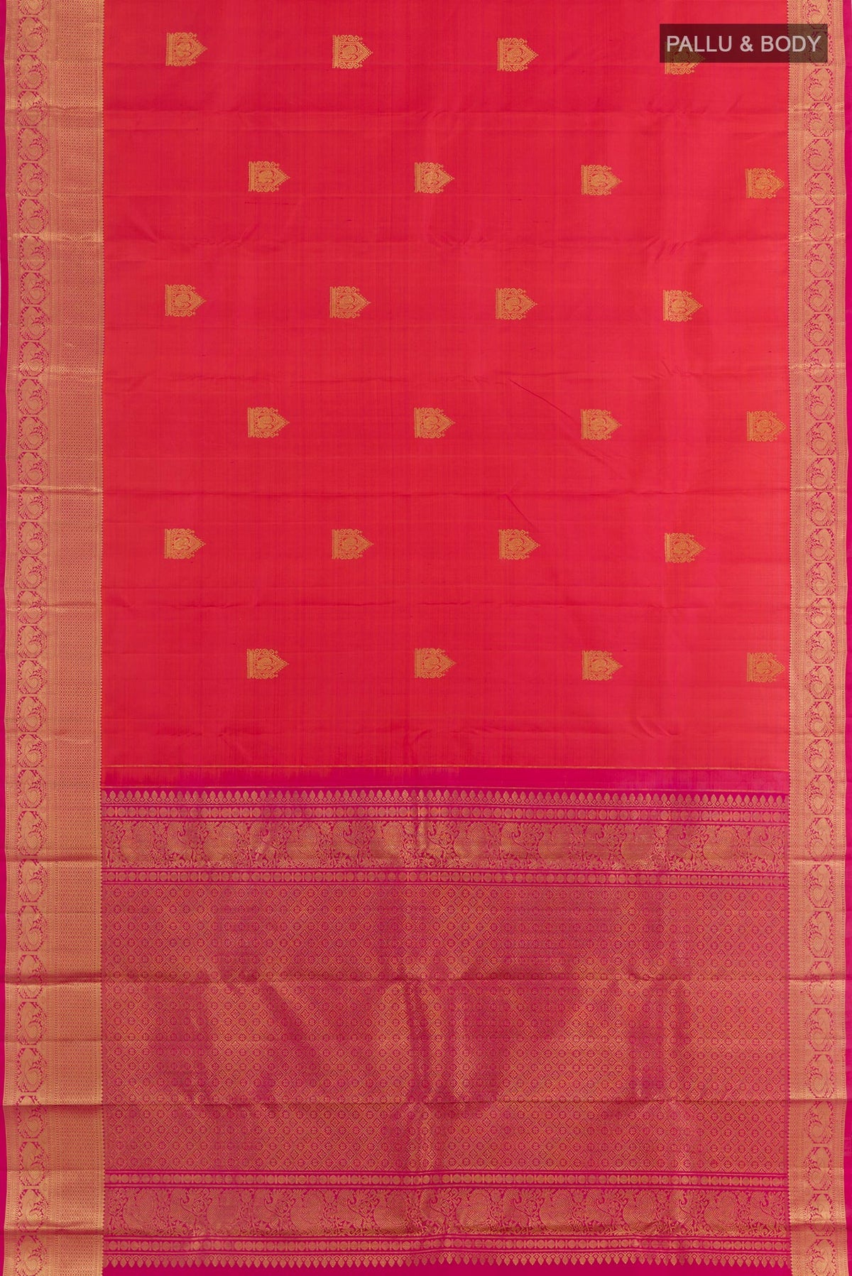 Flat view of Coral Dual Tone Kanchipuram Silk Saree with Zari Butta on the body and Zari Border. 