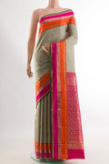 Grey Kanchipuram Silk Saree with Zari Butta on the body and Zari Border.  displayed on a mannequin