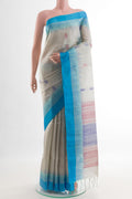 Grey Soft Silk Saree with Zari And Thread Butta on the body and Zari Border.  displayed on a mannequin