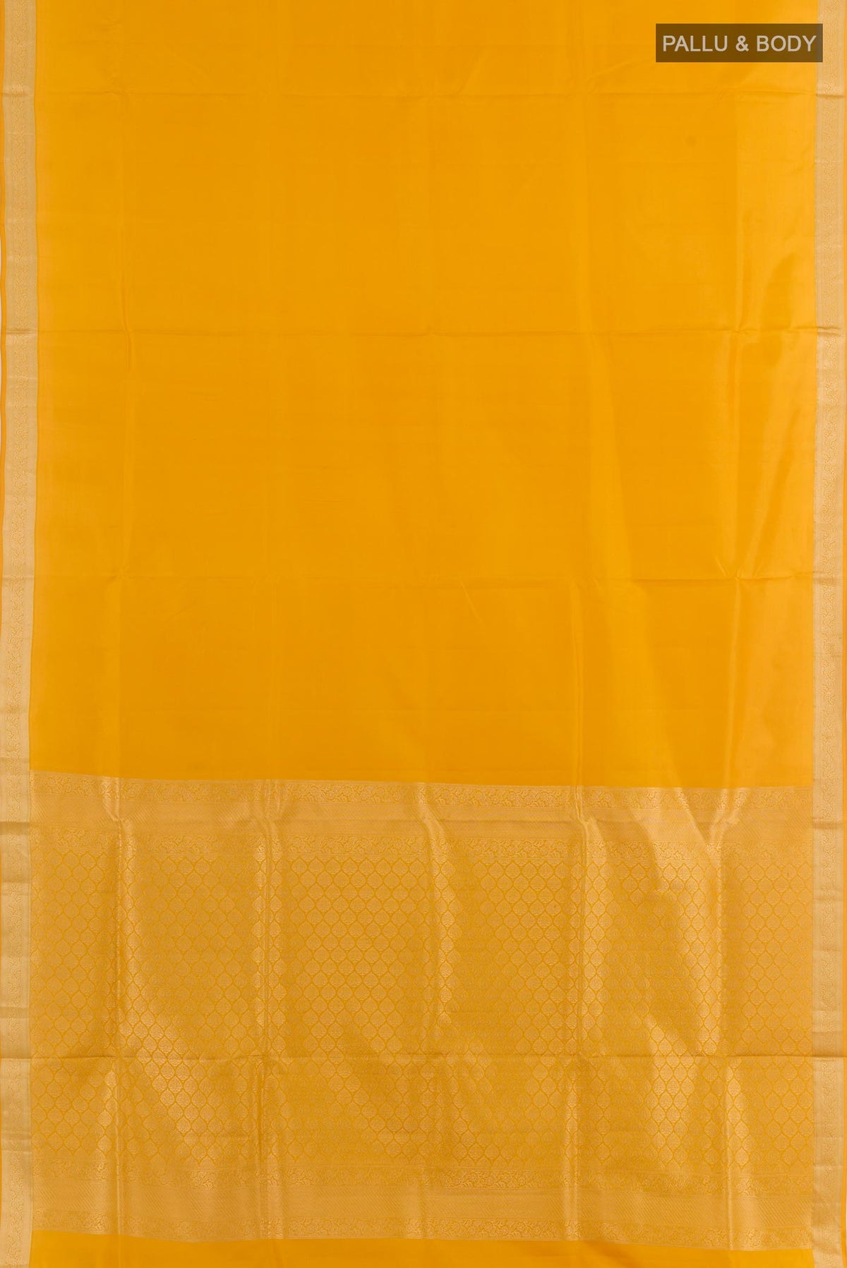 Flat view of Yellow Soft Silk Saree with Plain Body and Zari Border. 