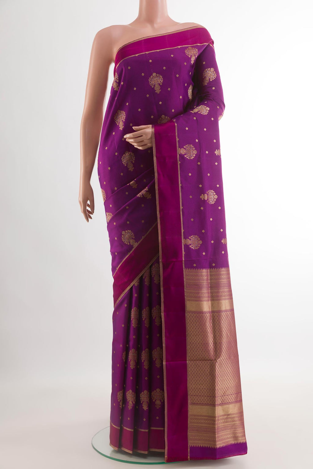 Purple Soft Silk Saree with Zari Butta on the body and Zari Border.  displayed on a mannequin