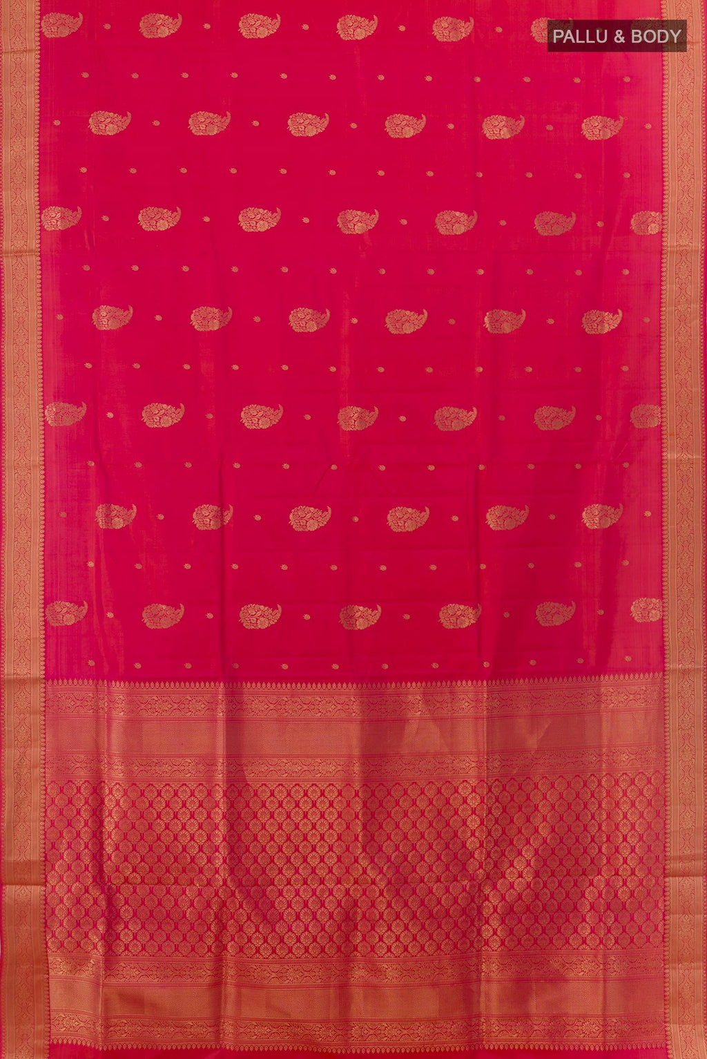Flat view of Pink Soft Silk Saree with Zari Butta on the body and Zari Border. 